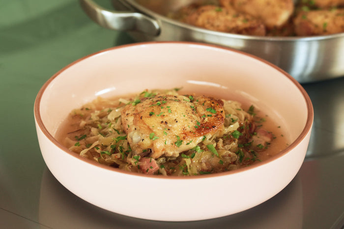 Crispy Braised Chicken Thighs with Cabbage and Bacon