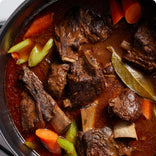 black perfect pot slow cook meat closeup