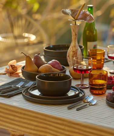 classic tablescape outdoors with always pan and tableware
