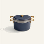 Blue pot with gold handles on a white background