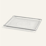 Metal mesh baking tray on a white background