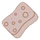 A pink rectangular sponge with holes.